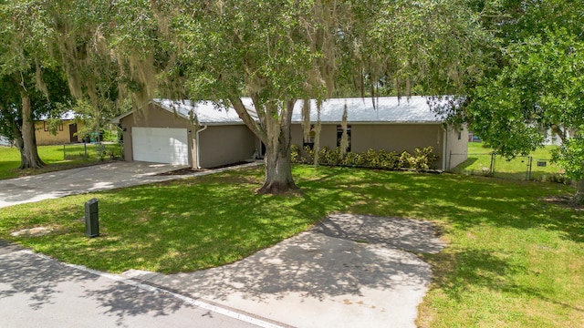 1793 SW 22nd Ter, Okeechobee, FL 34974 - ranch-style house featuring concrete driveway, stucco siding, and a garage