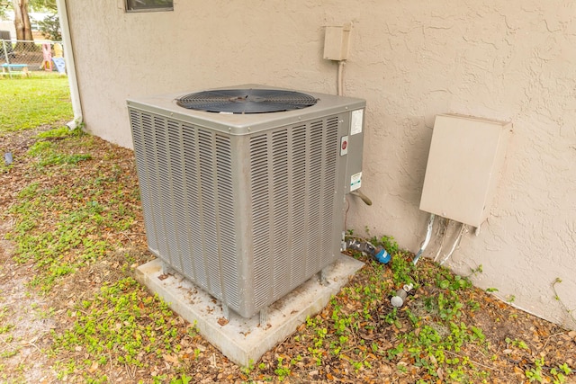 1793 SW 22nd Ter, Okeechobee, FL 34974 - exterior view of central air condition unit and stucco siding