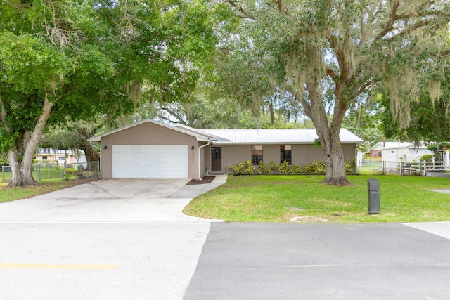 1793 SW 22nd Ter, Okeechobee, FL 34974 - ranch-style house featuring a garage, stucco siding, and driveway
