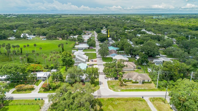 1793 SW 22nd Ter, Okeechobee, FL 34974 - aerial view of residential area with a heavily wooded area