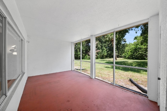 815 W Boynton Beach Blvd Unit 16-103, Boynton Beach, FL 33426 - unfurnished sunroom featuring plenty of natural light