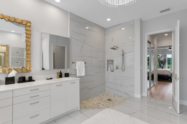 6636 Dana Point Cv, Delray Beach, FL 33446 - bathroom featuring a marble finish shower, ensuite bathroom, vanity, recessed lighting, and marble finish flooring