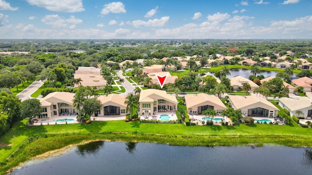 6636 Dana Point Cv, Delray Beach, FL 33446 - aerial perspective of suburban area featuring a pool and a nearby body of water