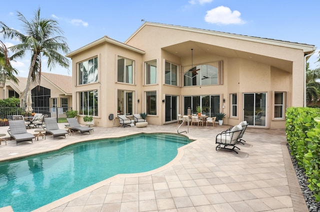 6636 Dana Point Cv, Delray Beach, FL 33446 - rear view of property with stucco siding, a patio, and ceiling fan