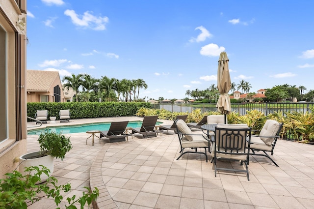 6636 Dana Point Cv, Delray Beach, FL 33446 - fenced backyard featuring a patio, a water view, and outdoor dining space