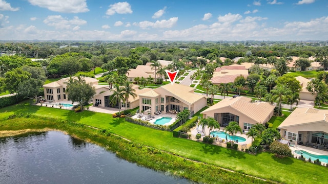 6636 Dana Point Cv, Delray Beach, FL 33446 - aerial view of residential area featuring a pool and a nearby body of water