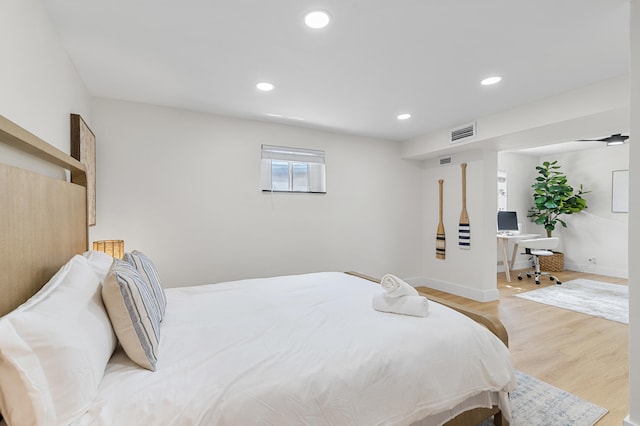 2137 Longwood Rd, West Palm Beach, FL 33409 - bedroom featuring light wood-type flooring, recessed lighting, and baseboards