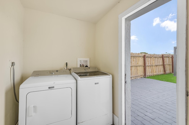 2137 Longwood Rd, West Palm Beach, FL 33409 - washroom featuring washer and dryer