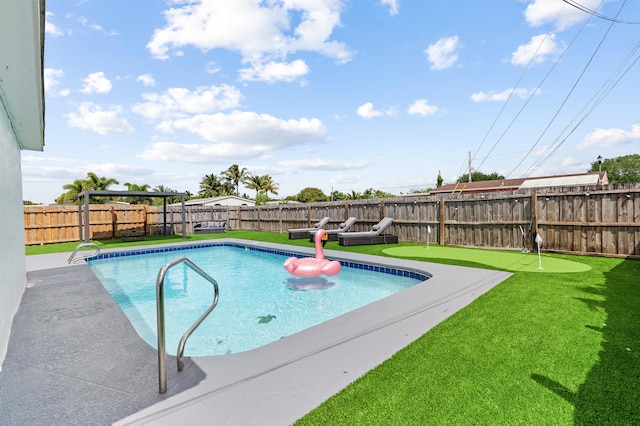 2137 Longwood Rd, West Palm Beach, FL 33409 - view of swimming pool featuring a putting green