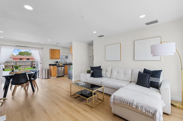 2137 Longwood Rd, West Palm Beach, FL 33409 - living area with light wood-style flooring and recessed lighting