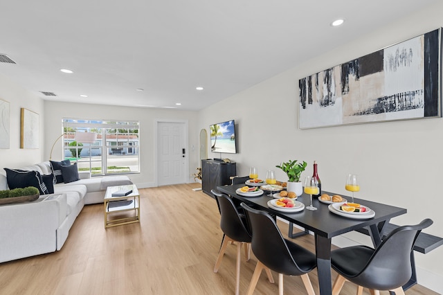 2137 Longwood Rd, West Palm Beach, FL 33409 - dining area featuring light wood finished floors and recessed lighting