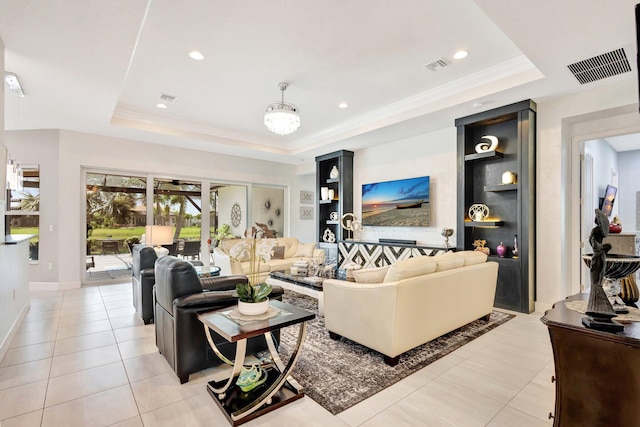 11051 SW Ivory Springs Ln, Port Saint Lucie, FL 34987 - living area featuring a raised ceiling, light tile patterned floors, recessed lighting, and baseboards