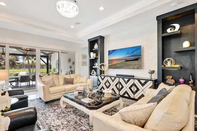 11051 SW Ivory Springs Ln, Port Saint Lucie, FL 34987 - living room with a chandelier, recessed lighting, and crown molding