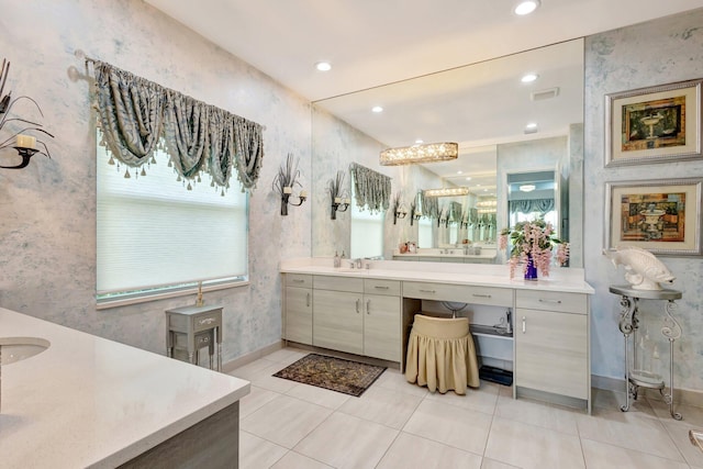 11051 SW Ivory Springs Ln, Port Saint Lucie, FL 34987 - bathroom featuring wallpapered walls, vanity, tile patterned flooring, baseboards, and recessed lighting