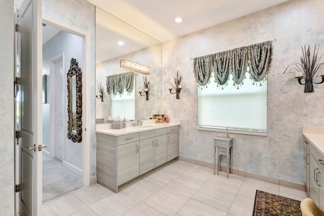 11051 SW Ivory Springs Ln, Port Saint Lucie, FL 34987 - full bath featuring vanity, tile patterned floors, baseboards, and wallpapered walls