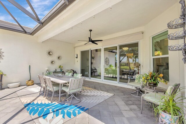 11051 SW Ivory Springs Ln, Port Saint Lucie, FL 34987 - view of patio with outdoor dining area and a ceiling fan