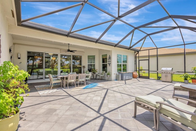 11051 SW Ivory Springs Ln, Port Saint Lucie, FL 34987 - view of patio with grilling area, ceiling fan, outdoor dining area, and a lanai