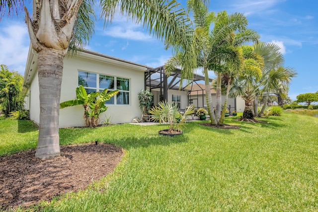 11051 SW Ivory Springs Ln, Port Saint Lucie, FL 34987 - view of green lawn featuring glass enclosure