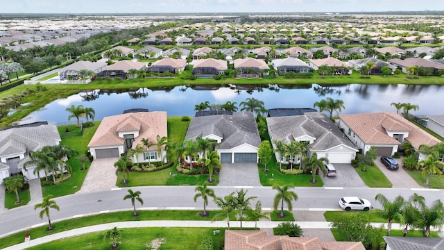 11051 SW Ivory Springs Ln, Port Saint Lucie, FL 34987 - aerial view of residential area with a large body of water