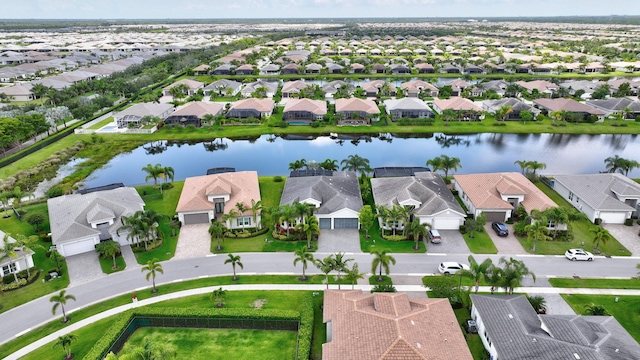 11051 SW Ivory Springs Ln, Port Saint Lucie, FL 34987 - aerial view of residential area with a large body of water