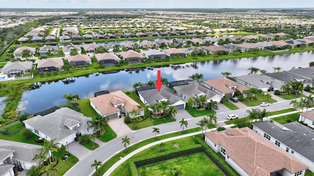 11051 SW Ivory Springs Ln, Port Saint Lucie, FL 34987 - aerial view of residential area featuring a large body of water