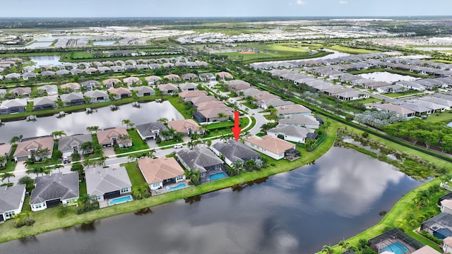 11051 SW Ivory Springs Ln, Port Saint Lucie, FL 34987 - aerial overview of property's location with nearby suburban area and a large body of water