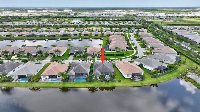 11051 SW Ivory Springs Ln, Port Saint Lucie, FL 34987 - aerial view of property's location with nearby suburban area and a large body of water
