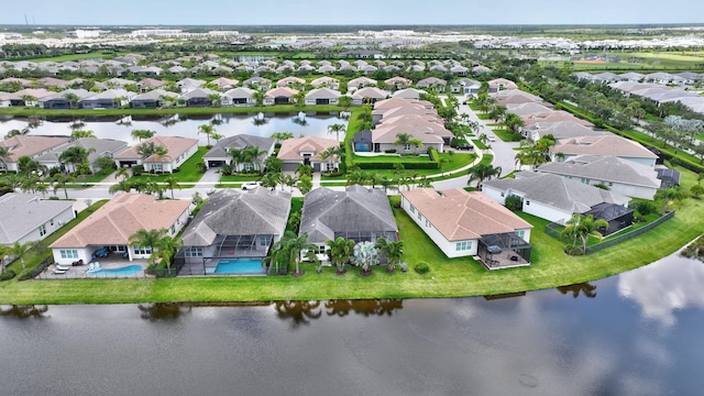 11051 SW Ivory Springs Ln, Port Saint Lucie, FL 34987 - aerial perspective of suburban area with a large body of water and a pool