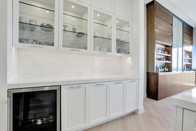 1 N Ocean Blvd Unit Ph05, Pompano Beach, FL 33062 - indoor dry bar featuring beverage cooler and light wood-style flooring