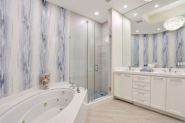 1 N Ocean Blvd Unit Ph05, Pompano Beach, FL 33062 - bathroom with a shower stall, a whirlpool tub, double vanity, and recessed lighting