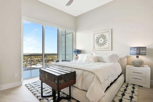 1 N Ocean Blvd Unit Ph05, Pompano Beach, FL 33062 - bedroom with baseboards and ceiling fan