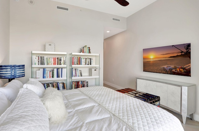 1 N Ocean Blvd Unit Ph05, Pompano Beach, FL 33062 - bedroom with baseboards, wood finished floors, and ceiling fan