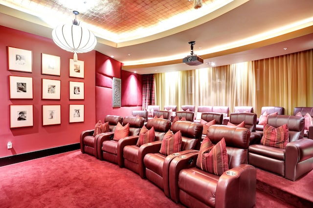 1 N Ocean Blvd Unit Ph05, Pompano Beach, FL 33062 - home theater room featuring carpet flooring, a tray ceiling, and baseboards