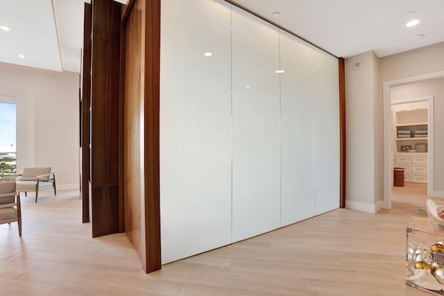1 N Ocean Blvd Unit Ph05, Pompano Beach, FL 33062 - hall with baseboards, light wood-type flooring, and recessed lighting