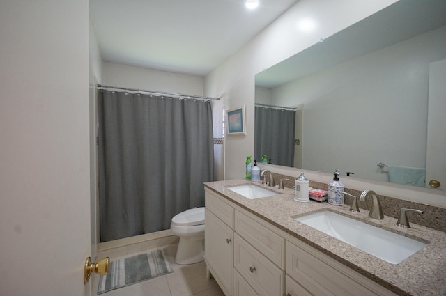 1902 SW 16th Ave, Boynton Beach, FL 33426 - full bath featuring toilet, double vanity, tile patterned floors, and curtained shower
