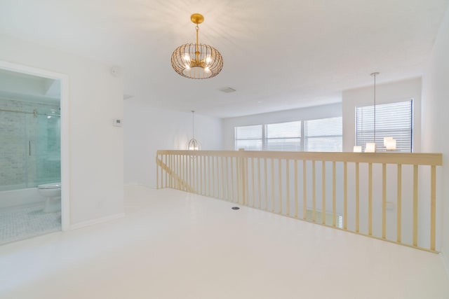 12236 Sag Harbor Ct Unit 3, Wellington, FL 33414 - unfurnished room with a chandelier and baseboards