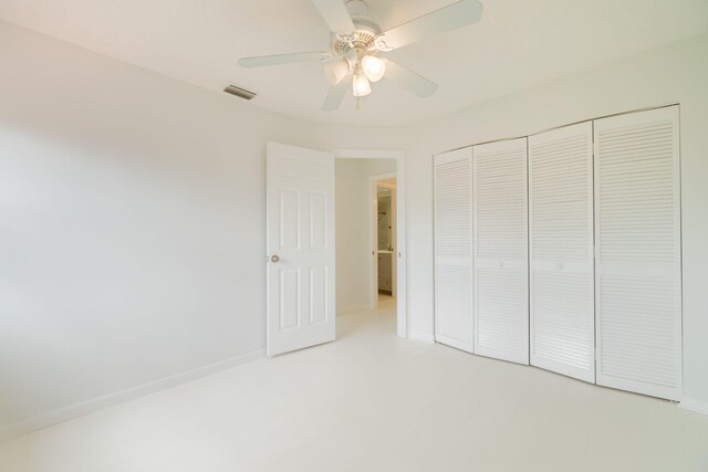 12236 Sag Harbor Ct Unit 3, Wellington, FL 33414 - unfurnished bedroom featuring a closet and a ceiling fan