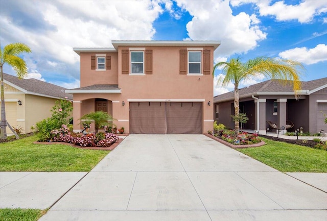 12314 SW Rimini Way, Port Saint Lucie, FL 34987 - traditional-style house with stucco siding, an attached garage, driveway, and a front yard