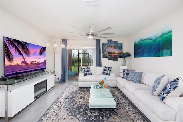 12314 SW Rimini Way, Port Saint Lucie, FL 34987 - living room with tile patterned flooring and a ceiling fan