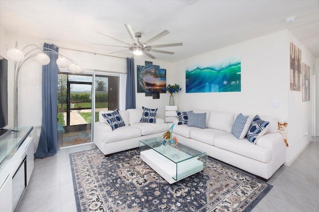 12314 SW Rimini Way, Port Saint Lucie, FL 34987 - living room with a ceiling fan and tile patterned flooring