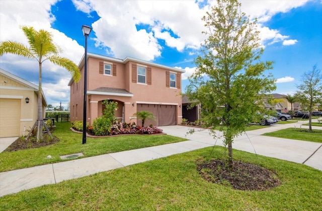 12314 SW Rimini Way, Port Saint Lucie, FL 34987 - view of front facade with concrete driveway, stucco siding, an attached garage, and a front lawn