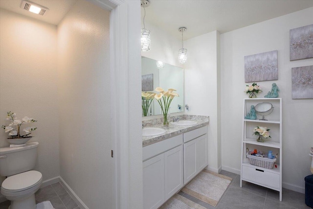 12314 SW Rimini Way, Port Saint Lucie, FL 34987 - full bath featuring toilet, tile patterned floors, and double vanity