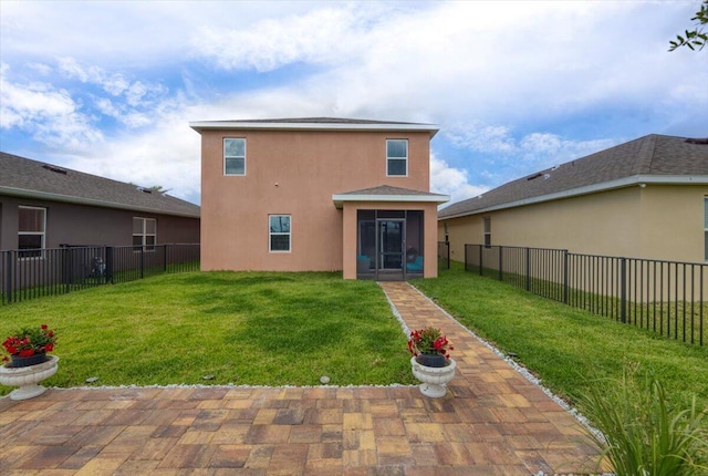 12314 SW Rimini Way, Port Saint Lucie, FL 34987 - back of house featuring stucco siding and a sunroom