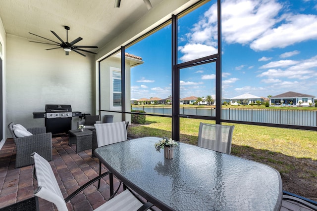 8762 SW Montova Way, Port Saint Lucie, FL 34987 - sunroom / solarium with ceiling fan, a water view, and outdoor dining area