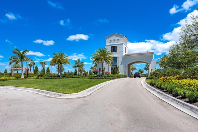 8762 SW Montova Way, Port Saint Lucie, FL 34987 - view of asphalt road featuring curbs
