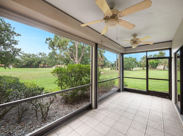 3961 SW Greenwood Way Unit D, Palm City, FL 34990 - unfurnished sunroom with a ceiling fan