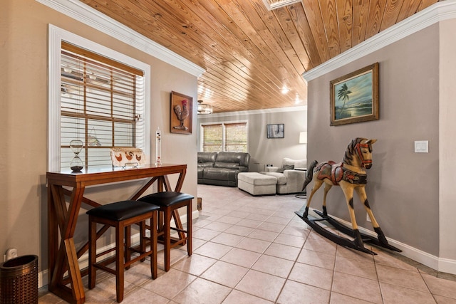 16673 75th Way N, Palm Beach Gardens, FL 33418 - dining space with wood ceiling, ornamental molding, light tile patterned floors, and baseboards