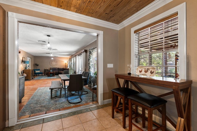 16673 75th Way N, Palm Beach Gardens, FL 33418 - dining area with light tile patterned flooring and ceiling fan