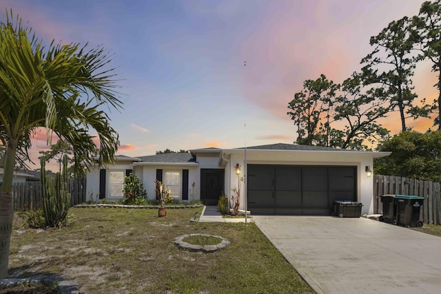 1649 Talbott St SE, Palm Bay, FL 32909 - ranch-style house with concrete driveway, a garage, and stucco siding
