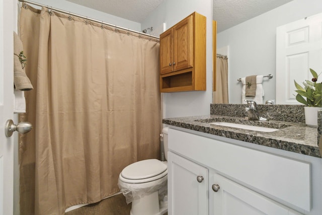 1649 Talbott St SE, Palm Bay, FL 32909 - bathroom with vanity, toilet, a textured ceiling, and a shower with shower curtain